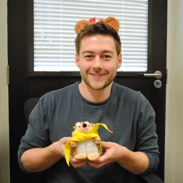 Broughton scientist wearing Pusey ears with Broughton hedgehog for Children in Need 2022 (7)