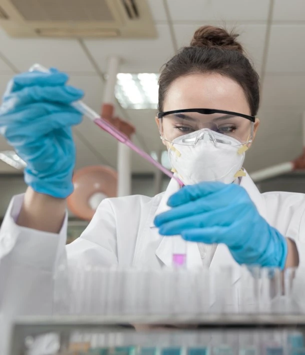 scientist working with test tubes