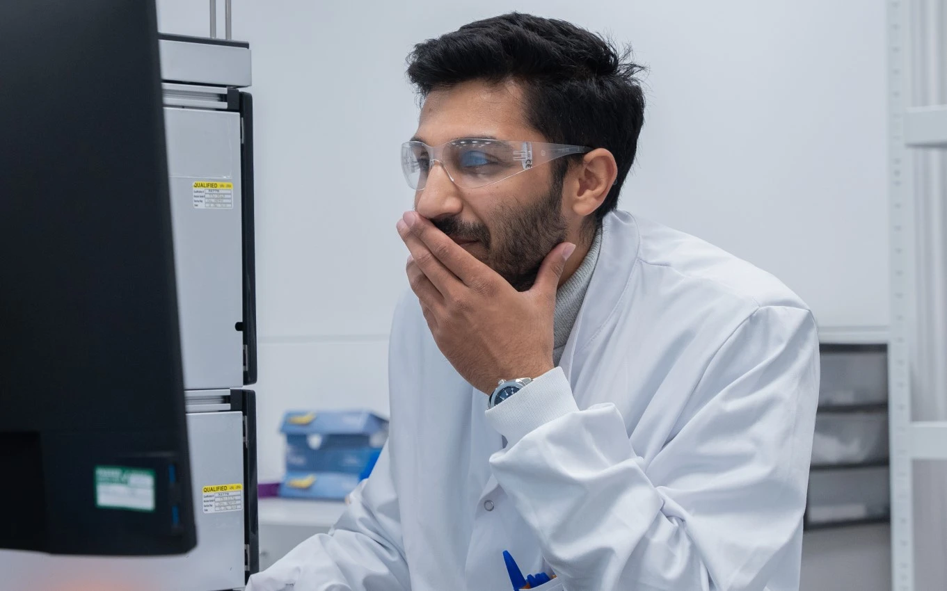 Broughton scientist working at a computer 