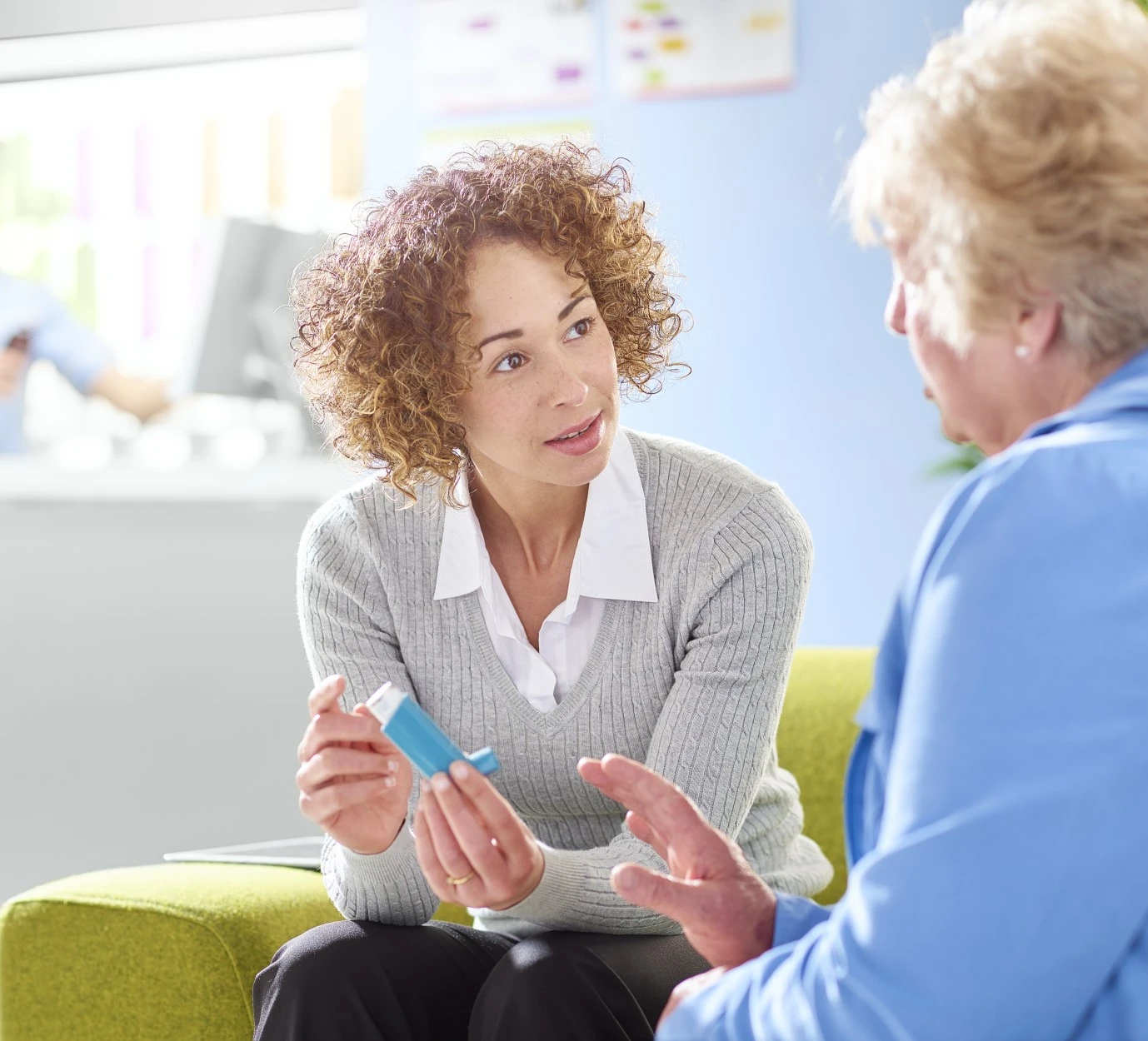 Doctor and patient with inhaler