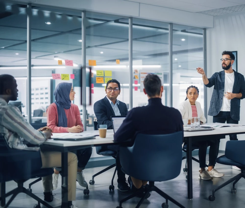 team meeting taking place in modern office